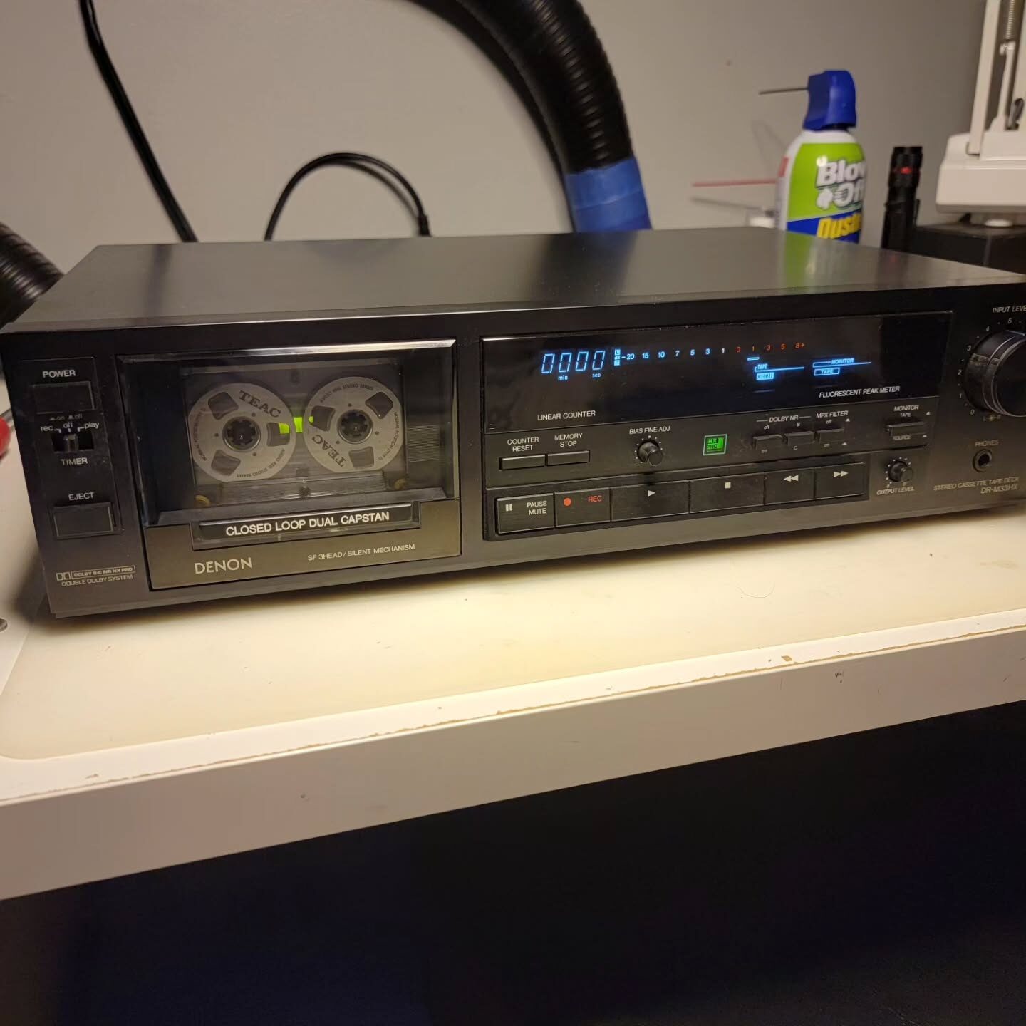 A Denon DR-M33HX three-head stereo cassette deck